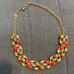 Vintage gold-tone necklace with gold orange and green lucite “stones” 16.5”